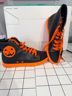 Strange Cvlt High-Top Sneakers in Black and Orange with Pumpkin Patch Accent